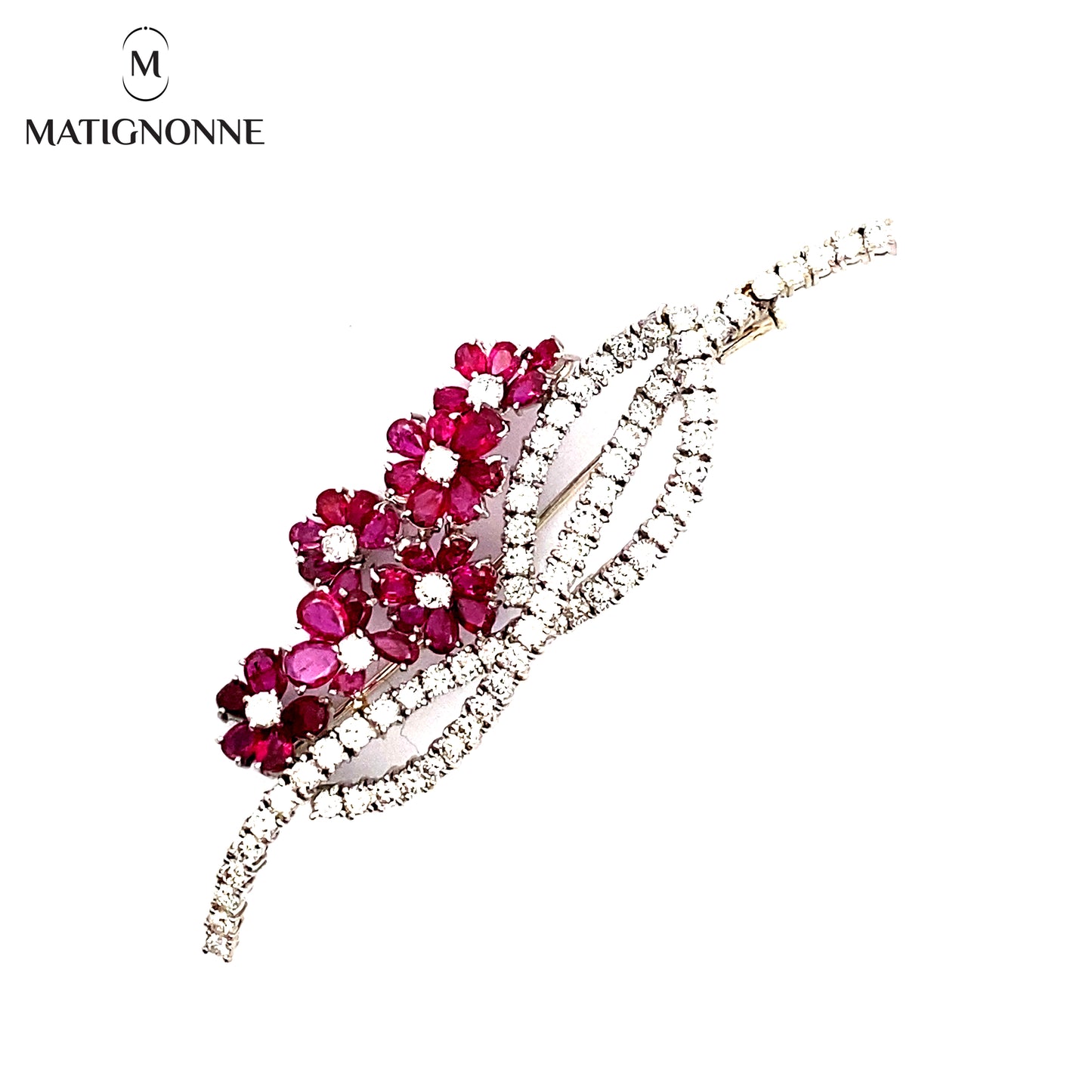 Fine jewelry brooch with diamonds and rubies