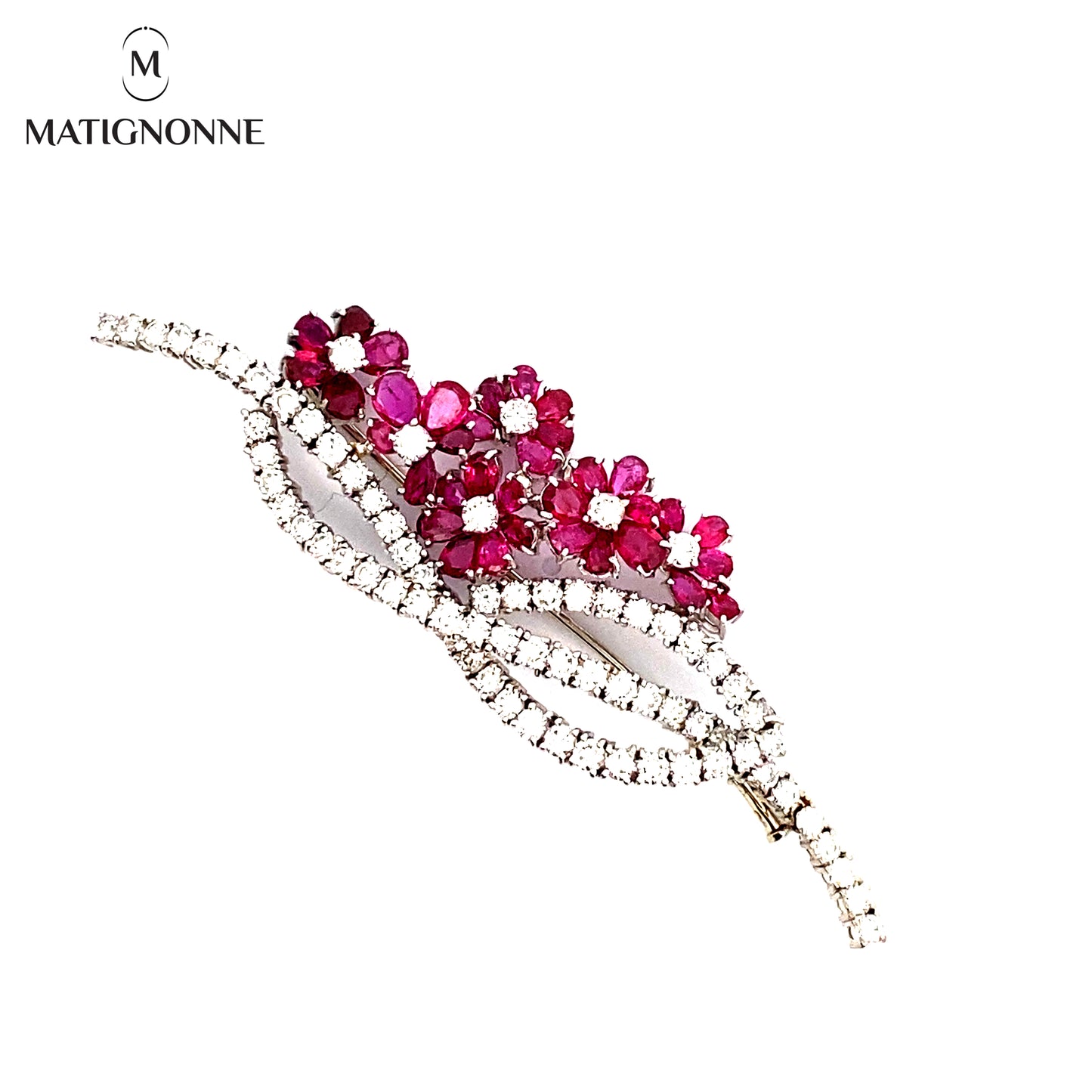 Fine jewelry brooch with diamonds and rubies