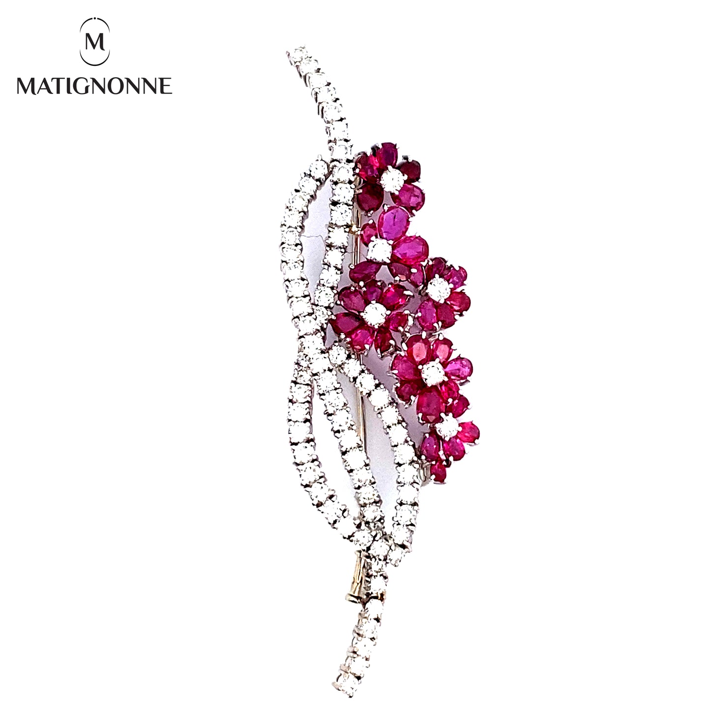 Fine jewelry brooch with diamonds and rubies