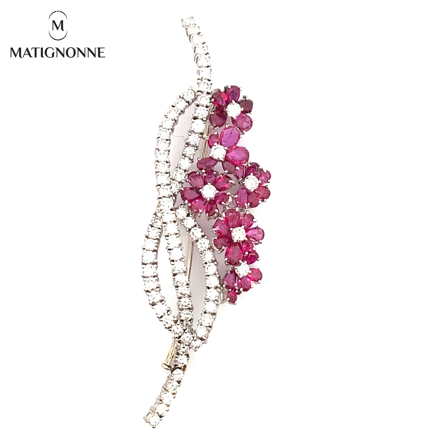 Fine jewelry brooch with diamonds and rubies