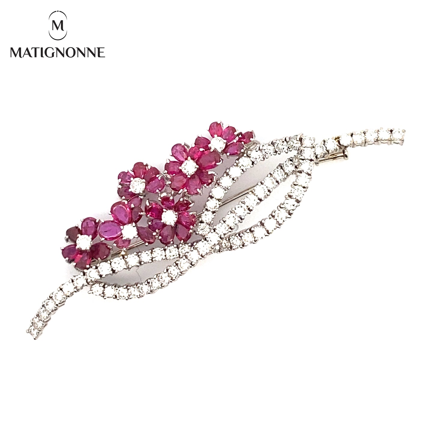 Fine jewelry brooch with diamonds and rubies