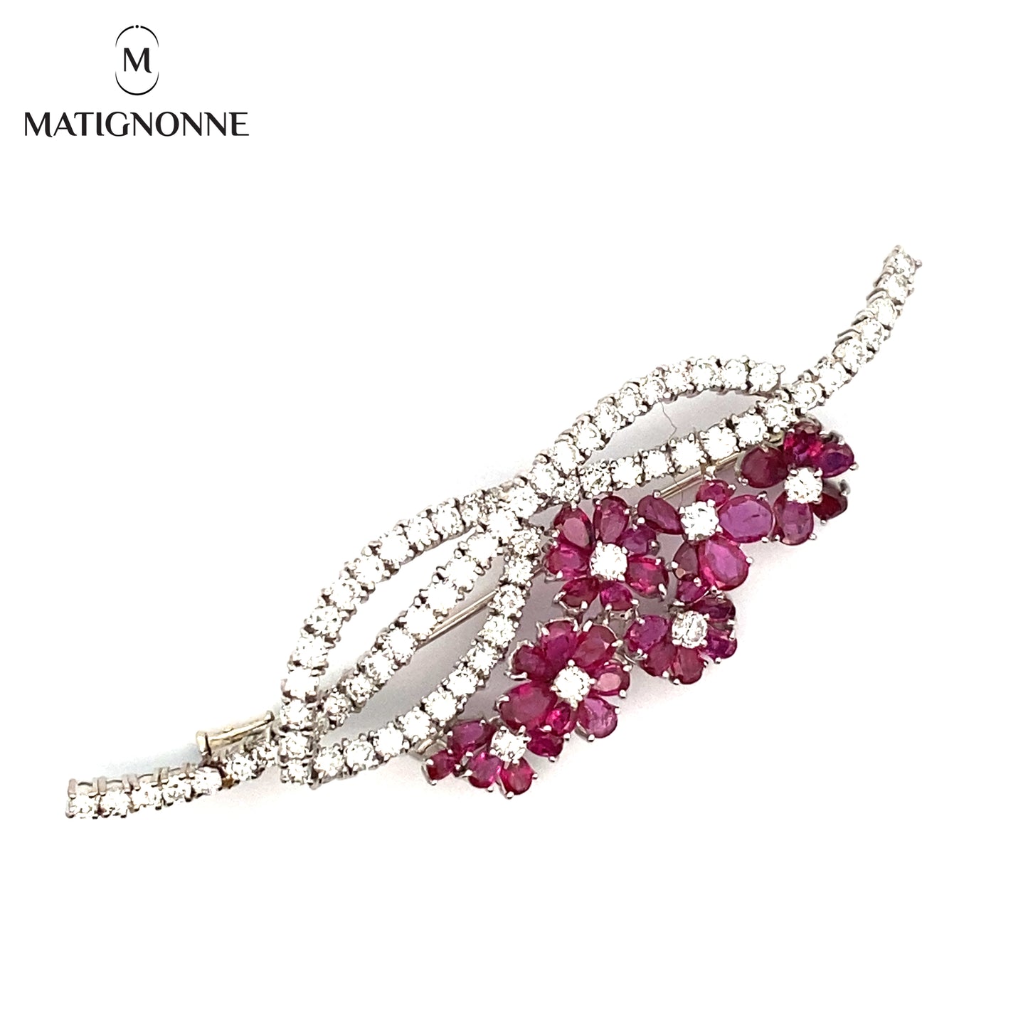 Fine jewelry brooch with diamonds and rubies