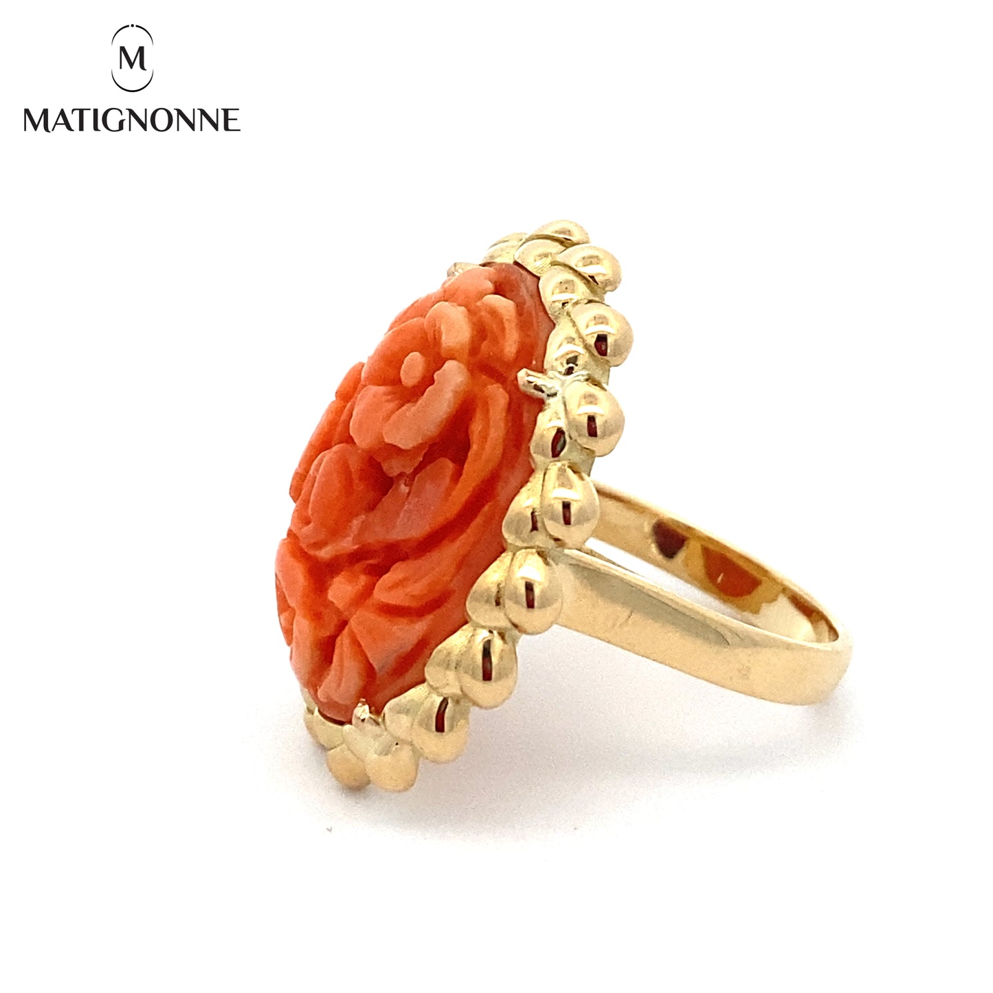 Carved coral cabochon ring