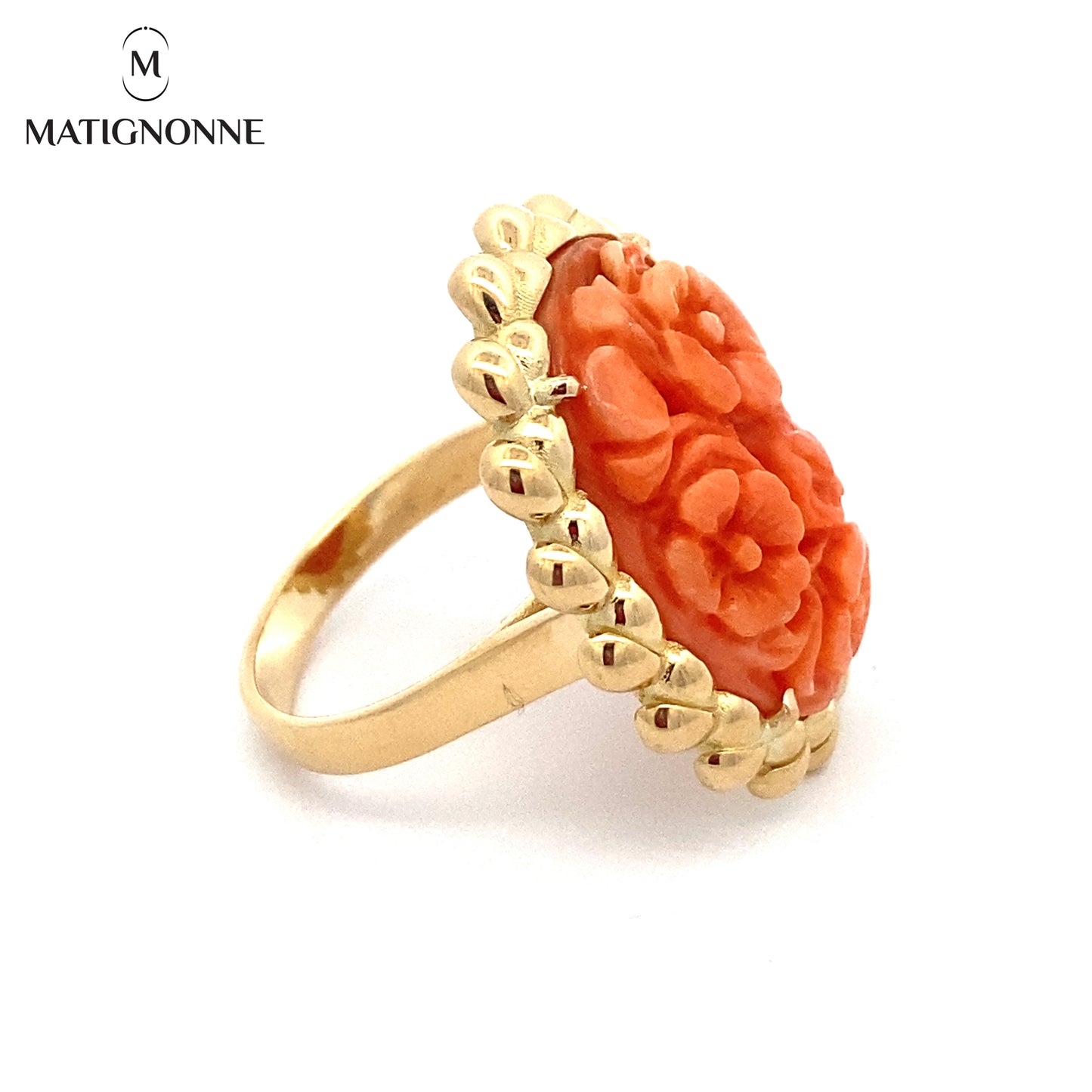 Carved coral cabochon ring