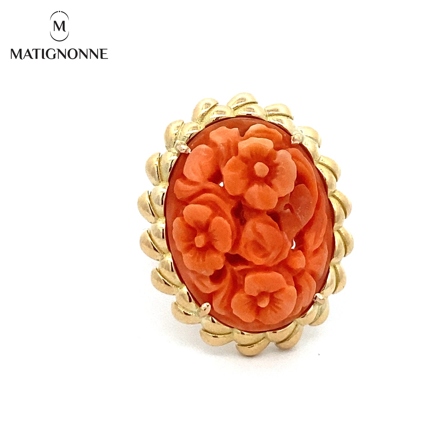 Carved coral cabochon ring