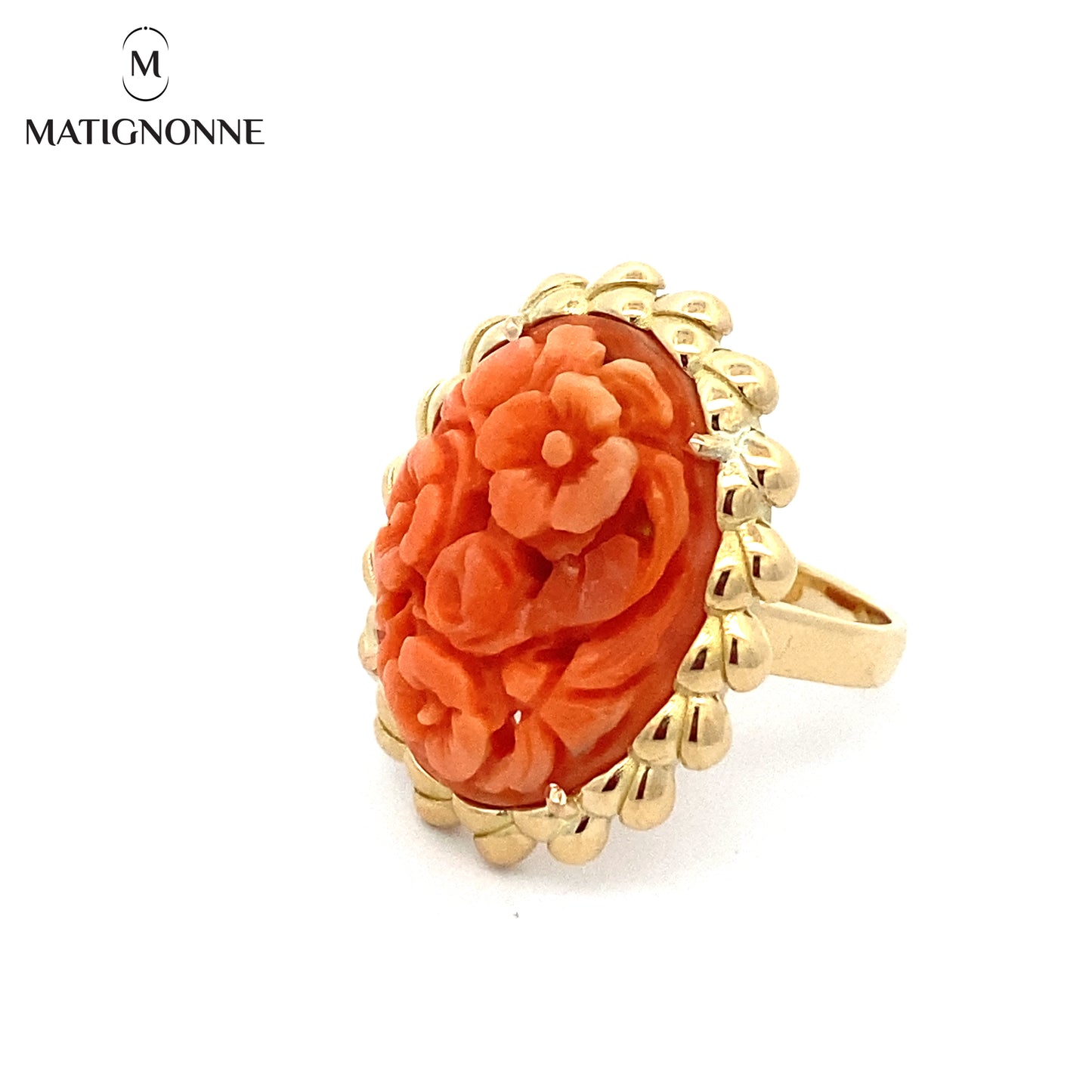 Carved coral cabochon ring