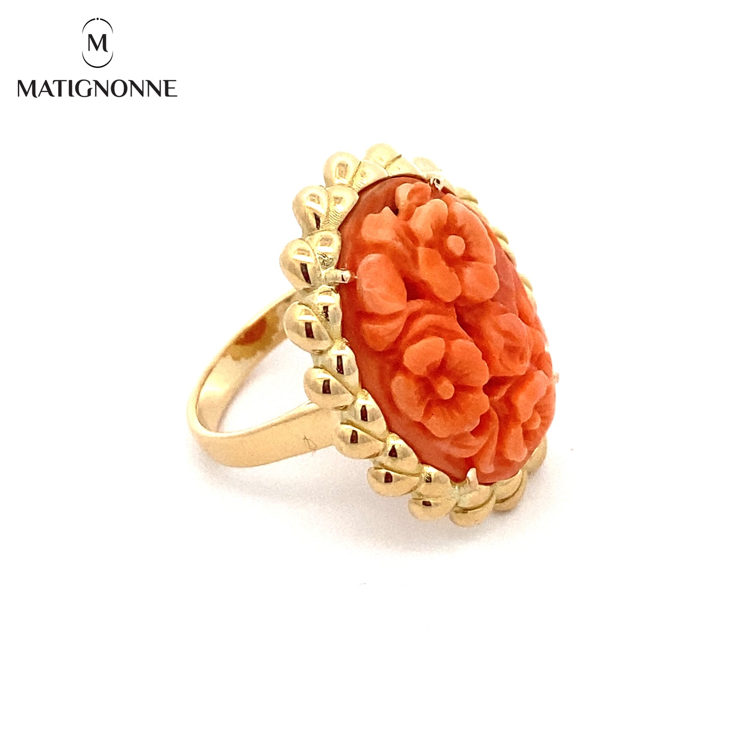 Carved coral cabochon ring