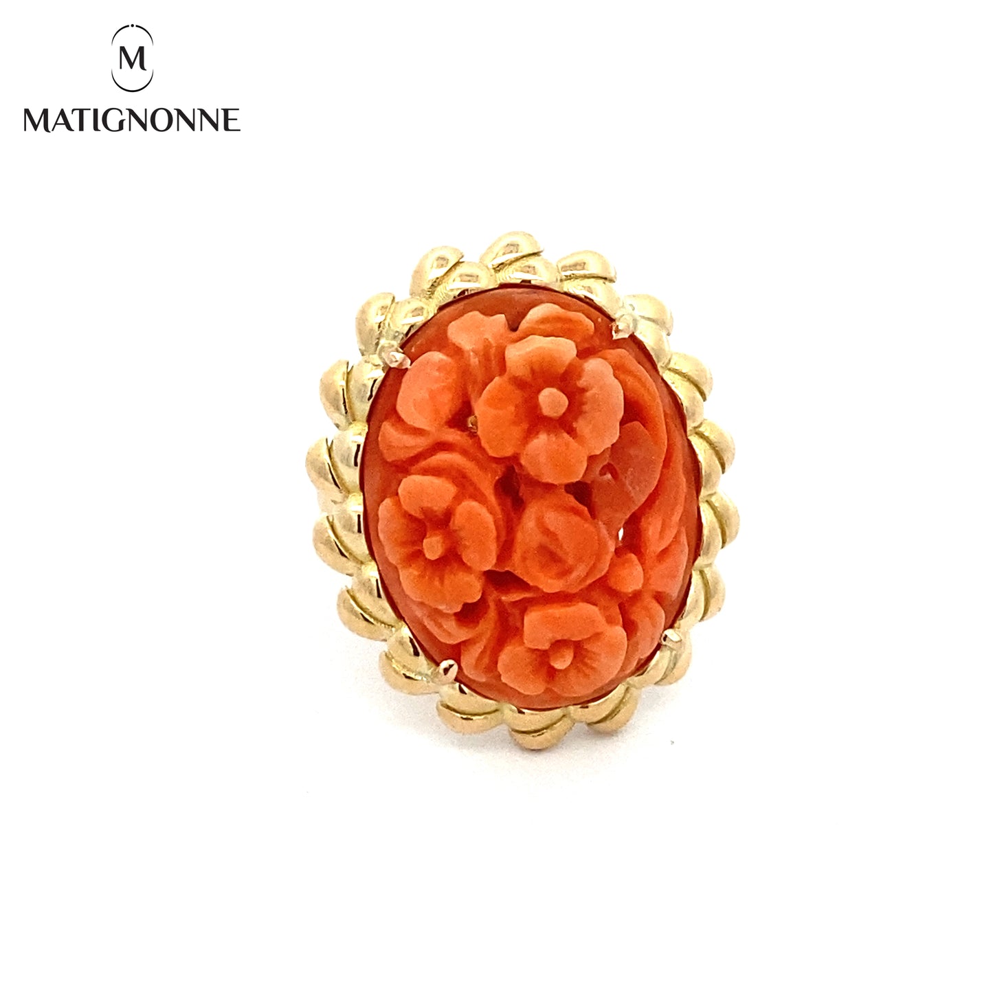 Carved coral cabochon ring