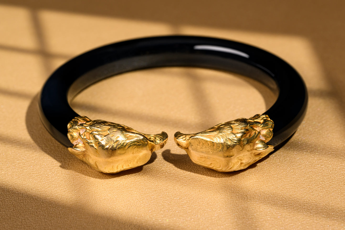 Re-used eagle heads bangle