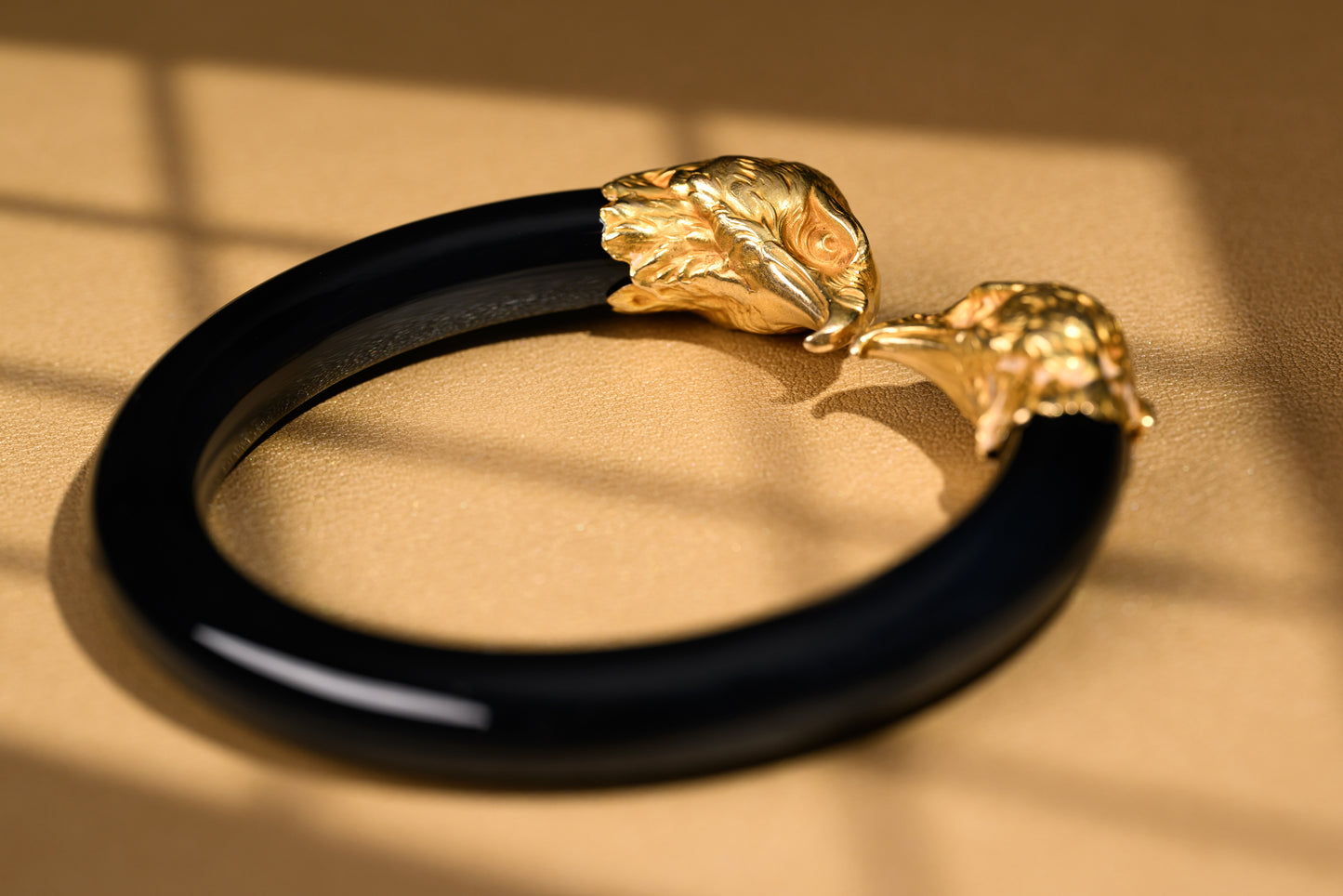 Re-used eagle heads bangle